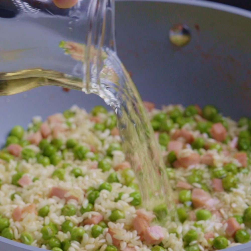 Risotto prosciutto e piselli - Step 6