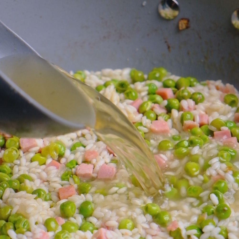 Risotto prosciutto e piselli - Step 7